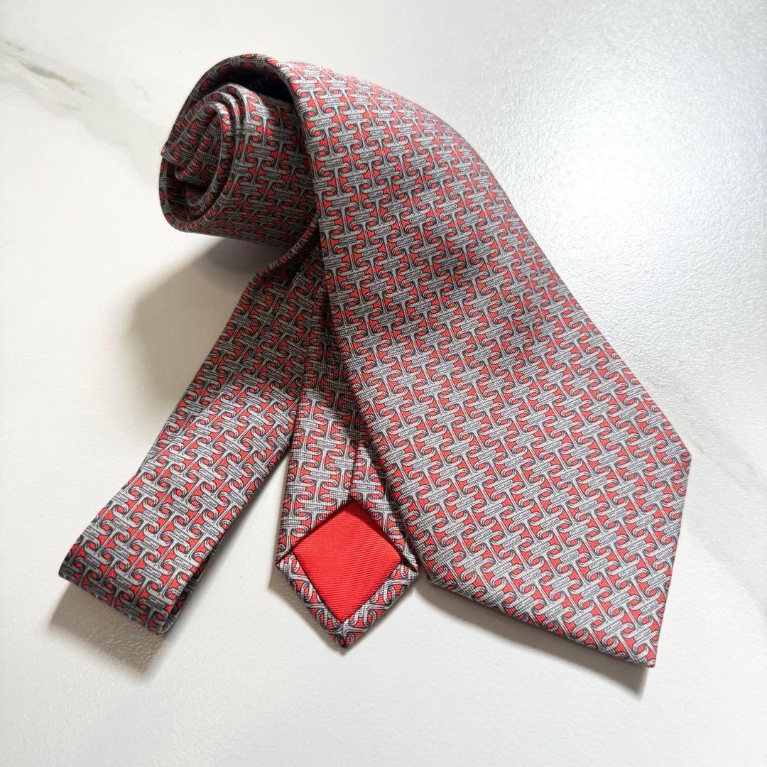 【正規品】未使用品HERMES エルメス　ネクタイ　朱色シルバー色