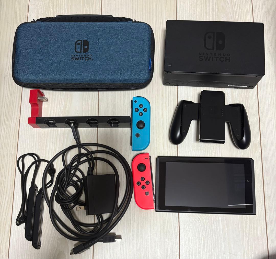 j*s様 Nintendo Switch 本体 + 充電スタンド、ケース