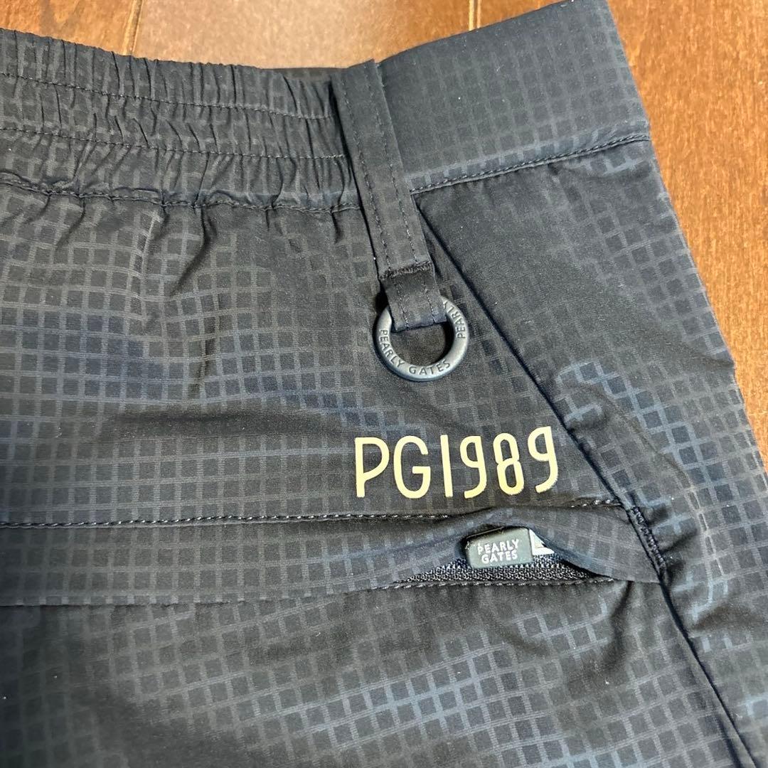 パーリーゲイツ P e ＷJQヘリポン　ハーフパンツ濃紺×黄色サイズ6